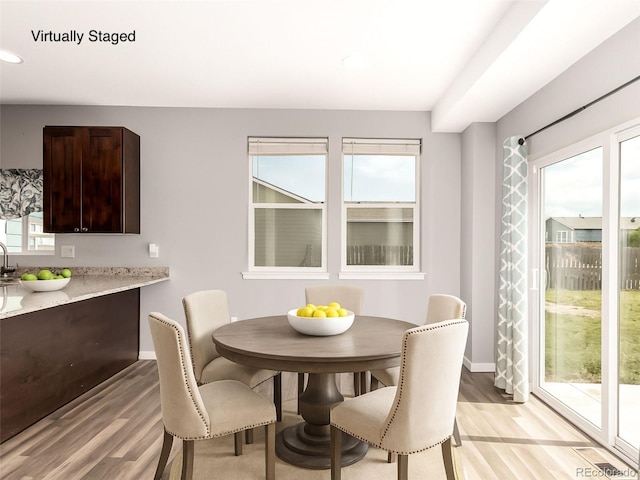 329 S 3rd Ave, Deer Trail, CO 80105 - dining space featuring healthy amount of natural light, light wood-style flooring, and recessed lighting