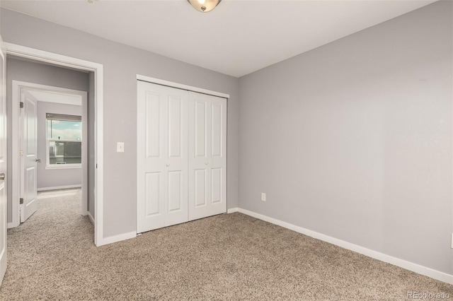 329 S 3rd Ave, Deer Trail, CO 80105 - unfurnished bedroom with carpet and a closet