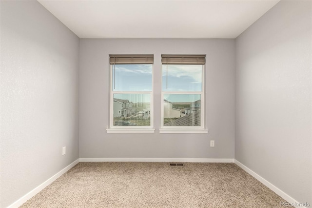 329 S 3rd Ave, Deer Trail, CO 80105 - carpeted spare room featuring baseboards