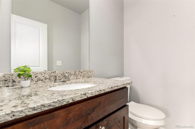 329 S 3rd Ave, Deer Trail, CO 80105 - bathroom featuring vanity and toilet