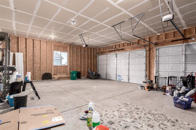 329 S 3rd Ave, Deer Trail, CO 80105 - garage featuring a garage door opener