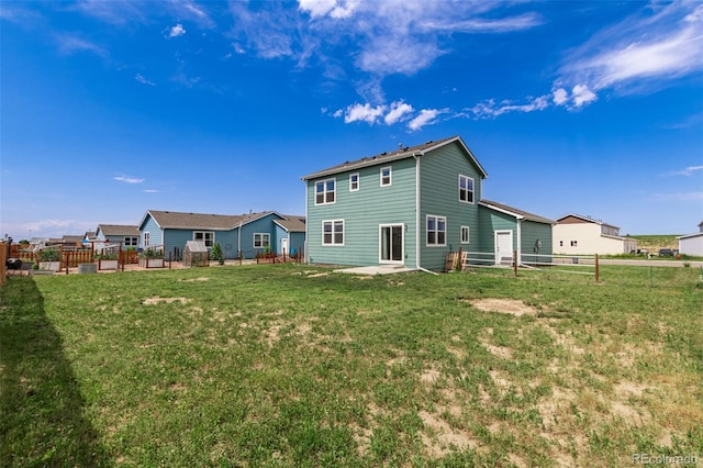 329 S 3rd Ave, Deer Trail, CO 80105 - rear view of property with a patio area