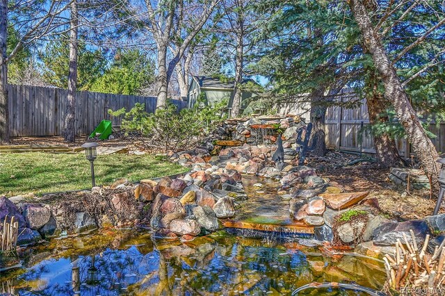 view of yard featuring a fenced backyard