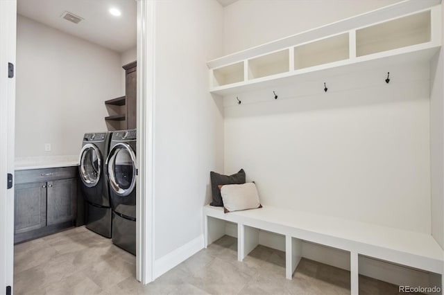 laundry room with washer and clothes dryer