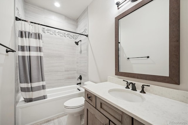 full bathroom featuring vanity, toilet, and shower / bathtub combination with curtain