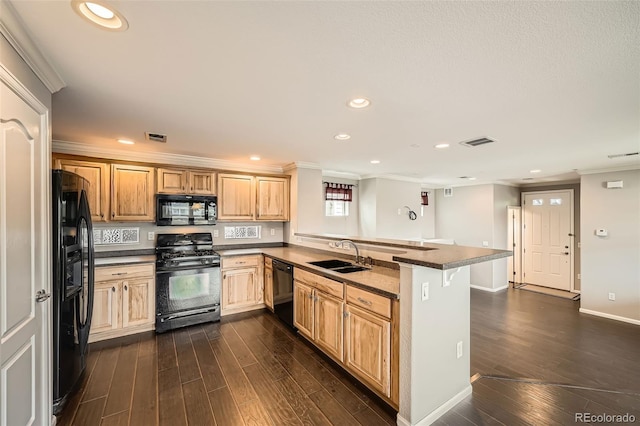 2538 Central Park Blvd, Denver, CO 80238 - kitchen featuring black appliances, a peninsula, dark wood-style floors, crown molding, and recessed lighting