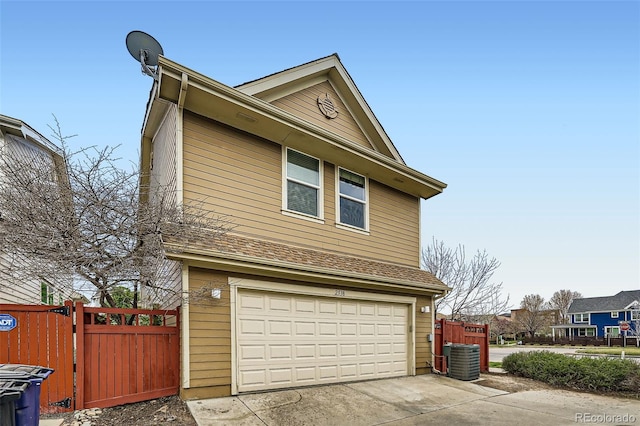 2538 Central Park Blvd, Denver, CO 80238 - view of home's exterior with driveway and an attached garage