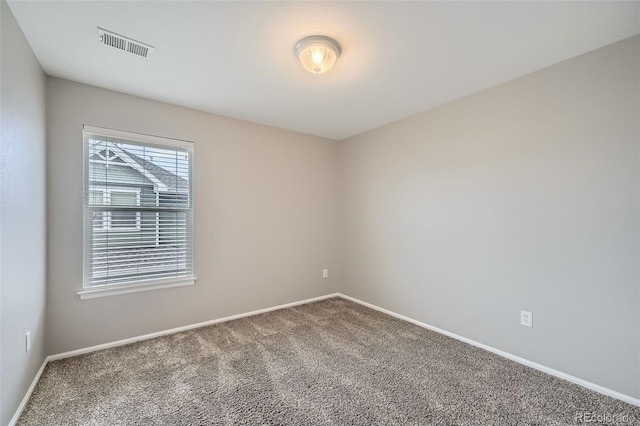 2538 Central Park Blvd, Denver, CO 80238 - carpeted spare room featuring baseboards