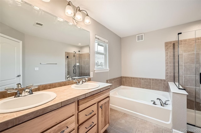 2538 Central Park Blvd, Denver, CO 80238 - bathroom with tile patterned flooring, a garden tub, a stall shower, and double vanity