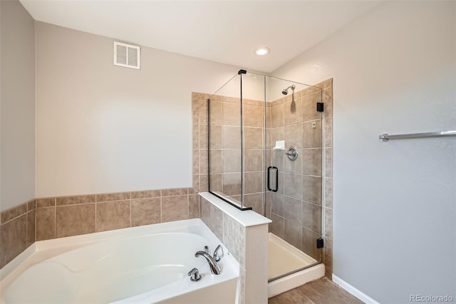 2538 Central Park Blvd, Denver, CO 80238 - bathroom with a bath and a shower stall