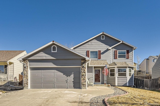 view of front of property with a garage