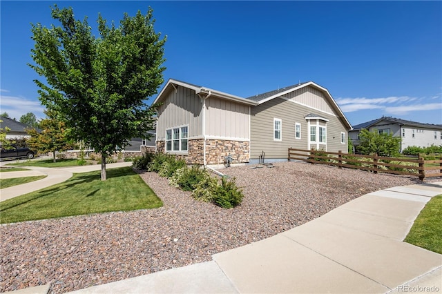 26722 E Peakview Pl, Aurora, CO 80016 - view of property exterior featuring board and batten siding and stone siding