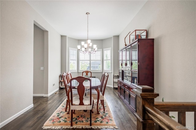 26722 E Peakview Pl, Aurora, CO 80016 - dining area with a chandelier and dark wood-type flooring