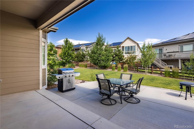 26722 E Peakview Pl, Aurora, CO 80016 - view of patio with grilling area, outdoor dining area, and stairs