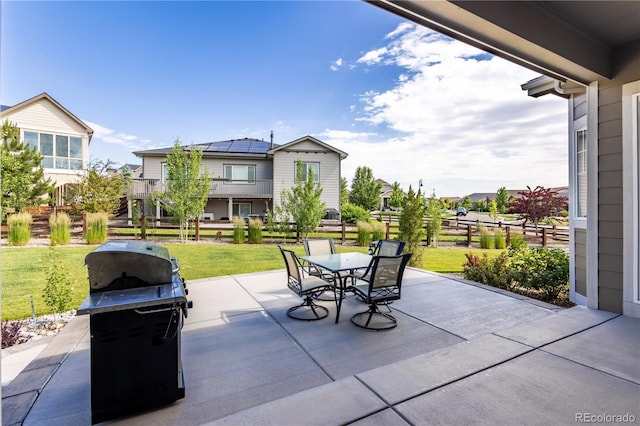 26722 E Peakview Pl, Aurora, CO 80016 - view of patio featuring a grill and outdoor dining space