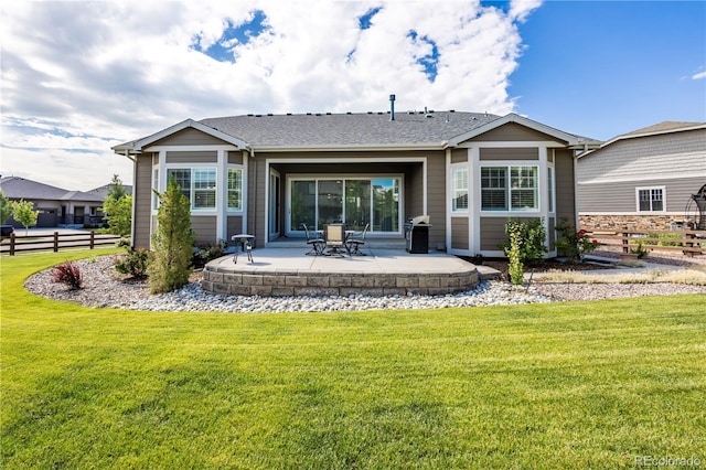 26722 E Peakview Pl, Aurora, CO 80016 - back of house with a patio area and roof with shingles