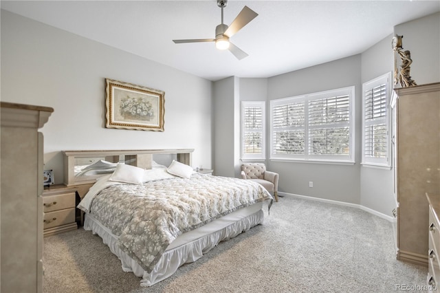 26722 E Peakview Pl, Aurora, CO 80016 - bedroom featuring multiple windows, light carpet, and ceiling fan