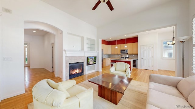 6187 Reed Way, Arvada, CO 80003 - living area with a ceiling fan, healthy amount of natural light, light wood-style flooring, and recessed lighting