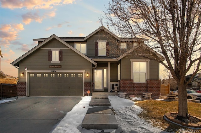 craftsman-style home featuring a garage