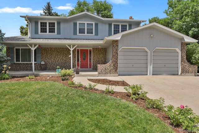 8277 Teller Ct, Arvada, CO 80003 - traditional-style house with brick siding, an attached garage, driveway, and covered porch