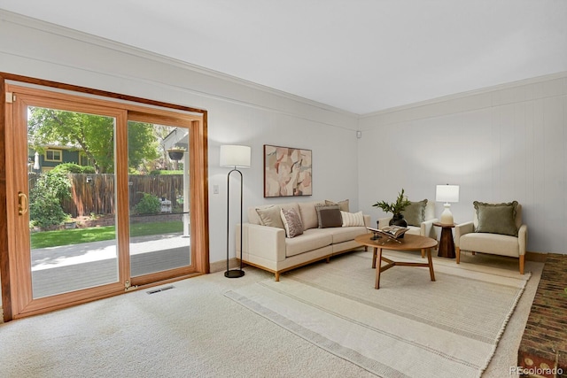 8277 Teller Ct, Arvada, CO 80003 - carpeted living room featuring ornamental molding and baseboards