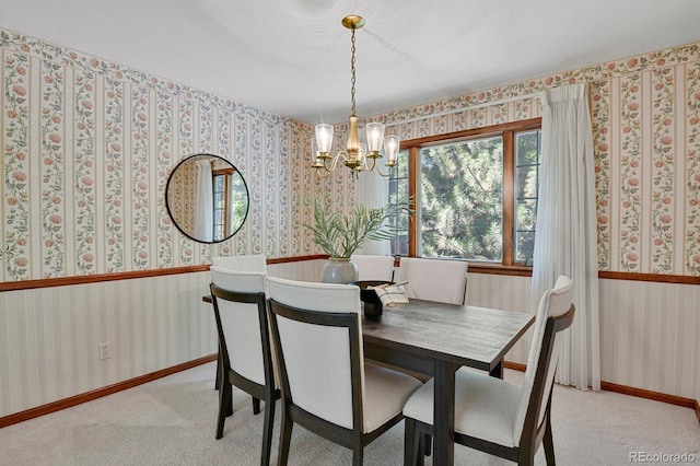 8277 Teller Ct, Arvada, CO 80003 - dining area with wallpapered walls, a chandelier, plenty of natural light, and light carpet
