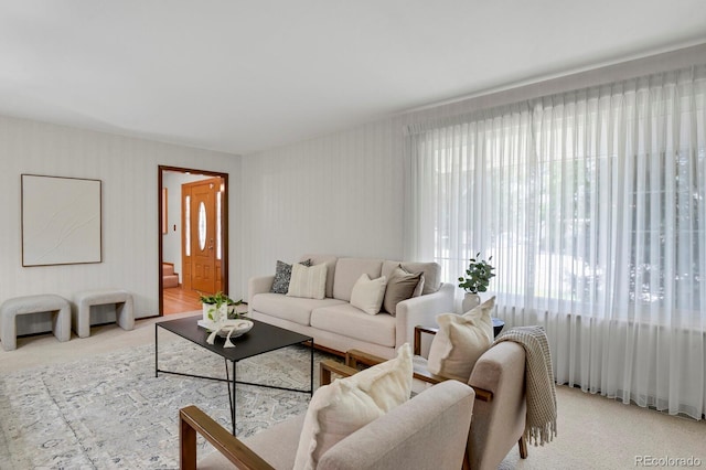 8277 Teller Ct, Arvada, CO 80003 - living area featuring light carpet and wallpapered walls