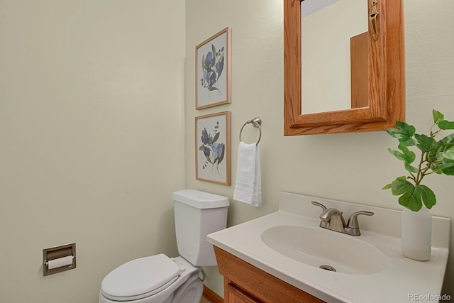8277 Teller Ct, Arvada, CO 80003 - bathroom with toilet and vanity
