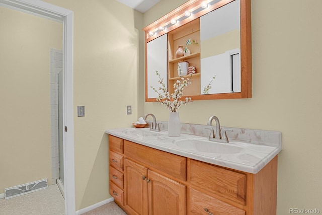 8277 Teller Ct, Arvada, CO 80003 - bathroom with double vanity and baseboards