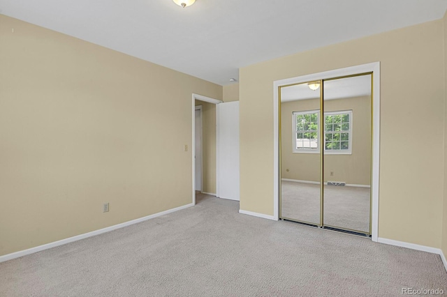 8277 Teller Ct, Arvada, CO 80003 - unfurnished bedroom featuring carpet floors and a closet