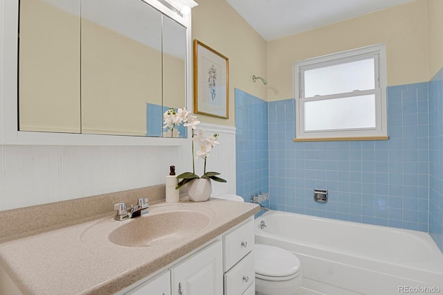 8277 Teller Ct, Arvada, CO 80003 - full bathroom featuring vanity, bathtub / shower combination, and wainscoting