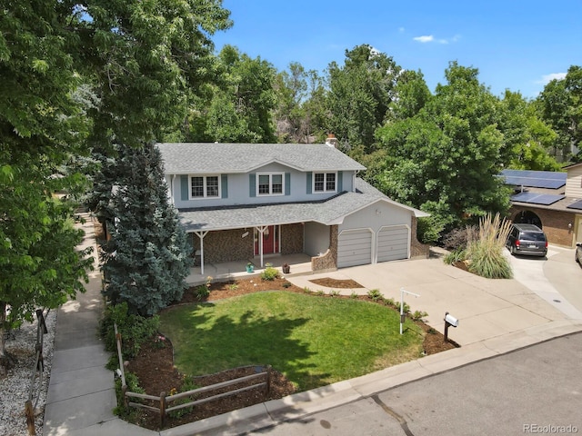 8277 Teller Ct, Arvada, CO 80003 - traditional-style house with covered porch, driveway, an attached garage, a front lawn, and a shingled roof