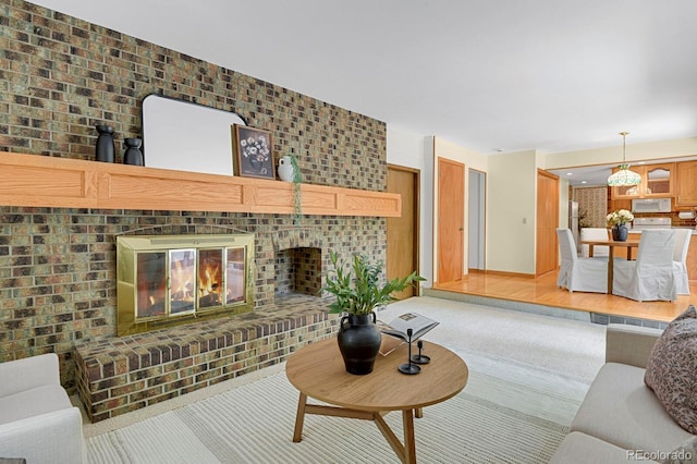 8277 Teller Ct, Arvada, CO 80003 - living area featuring a fireplace and light colored carpet