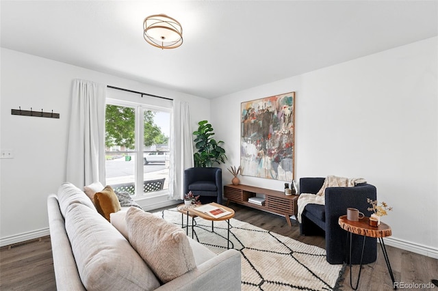 9315 Field Ln, Westminster, CO 80021 - living area with wood finished floors and baseboards