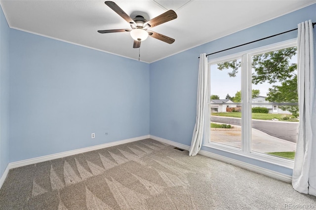 9315 Field Ln, Westminster, CO 80021 - spare room with carpet floors, a ceiling fan, baseboards, and crown molding