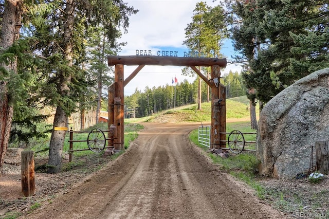 60 N County Highway 67, Sedalia, CO 80135 - view of dirt / gravel road with a gated entry