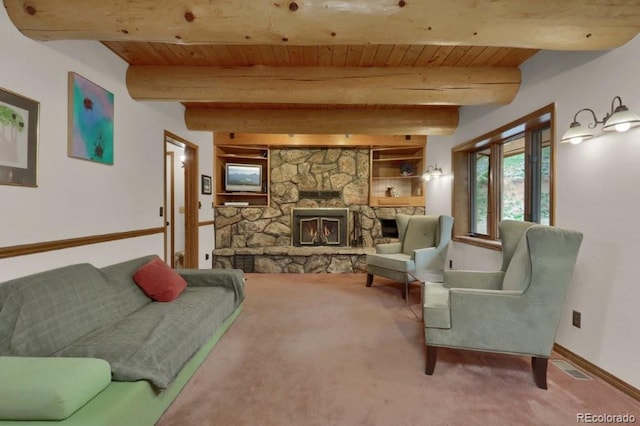 60 N County Highway 67, Sedalia, CO 80135 - living room featuring a wood ceiling with exposed beams, a stone fireplace, and carpet