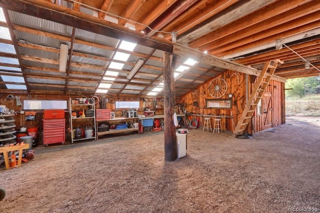 60 N County Highway 67, Sedalia, CO 80135 - misc room featuring a workshop area, healthy amount of natural light, and vaulted ceiling