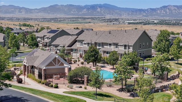 4718 Raven Run, Broomfield, CO 80023 - aerial view of residential area featuring mountains and a pool