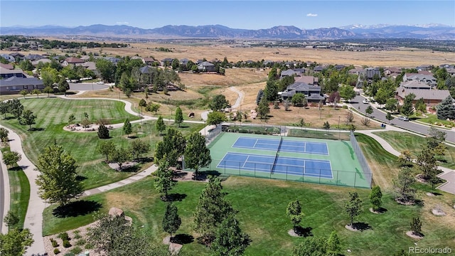 4718 Raven Run, Broomfield, CO 80023 - aerial overview of property's location featuring mountains and nearby suburban area