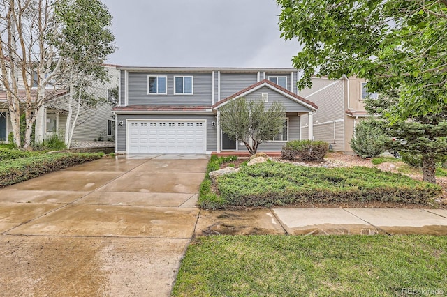 5120 Perth St, Denver, CO 80249 - traditional-style house featuring a garage and concrete driveway