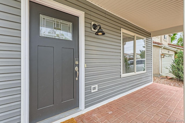 5120 Perth St, Denver, CO 80249 - entrance to property featuring covered porch