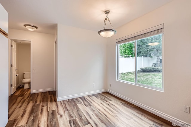 5120 Perth St, Denver, CO 80249 - unfurnished room with light wood-style floors and baseboards