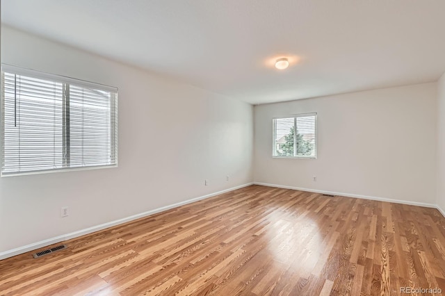 5120 Perth St, Denver, CO 80249 - spare room featuring light wood-type flooring and baseboards