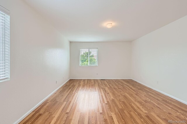5120 Perth St, Denver, CO 80249 - unfurnished room with light wood-type flooring and baseboards