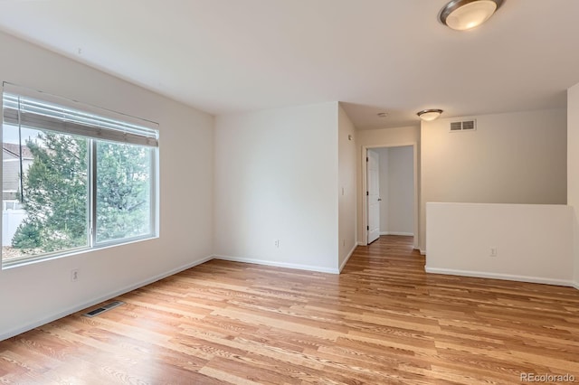 5120 Perth St, Denver, CO 80249 - empty room with light wood-style flooring and baseboards