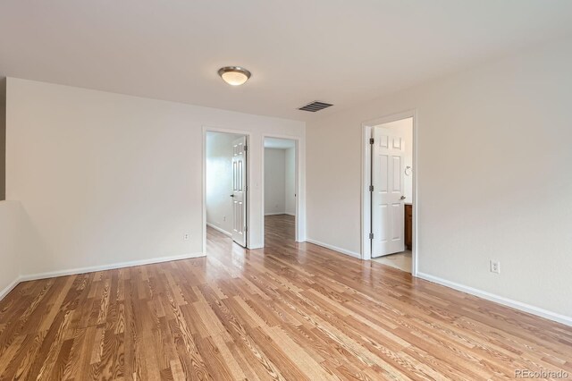 5120 Perth St, Denver, CO 80249 - spare room with light wood-type flooring and baseboards