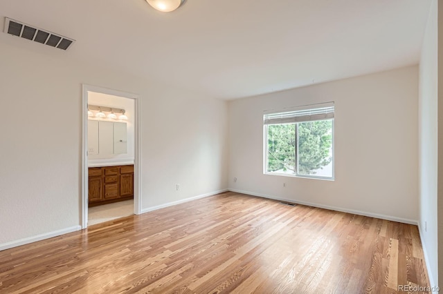 5120 Perth St, Denver, CO 80249 - empty room featuring light wood finished floors and baseboards
