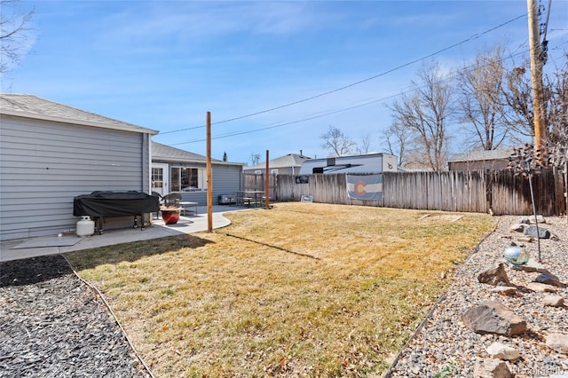 view of yard featuring fence private yard and a patio