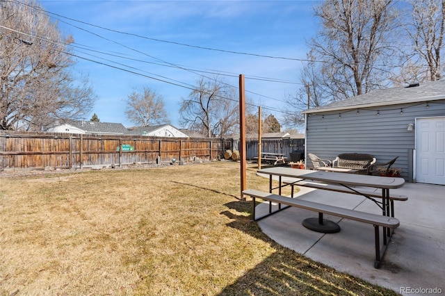 view of yard with a fenced backyard and a patio